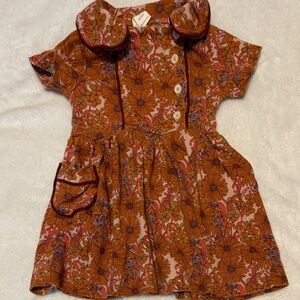 Kate Quinn Floral Toddler Apron Dress in Orange and Purple